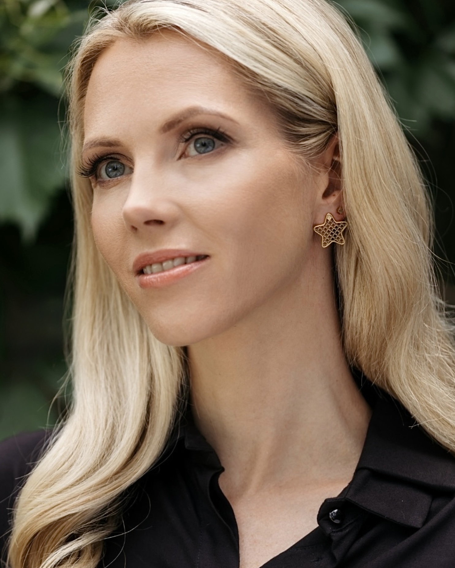 Ines Karu-Salo wearing KiRiVOO star earrings
